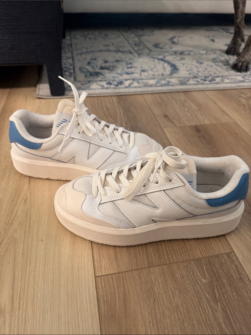 New Balance Women’s Cream Sneakers with Blue Heel